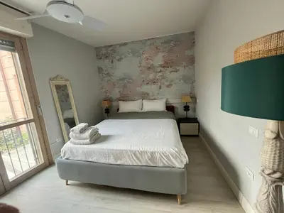 Letto o letti in una camera di Facibeni Rooms con Parking