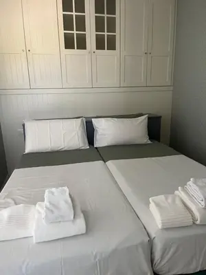Letto o letti in una camera di Facibeni Rooms con Parking