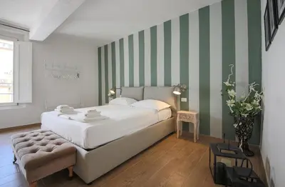 Letto o letti in una camera di Apartments Florence - San Marco Suite 3