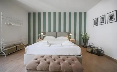 Letto o letti in una camera di Apartments Florence - San Marco Suite 3