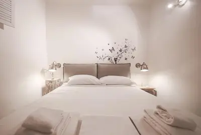 Letto o letti in una camera di Apartments Florence - San Marco Suite 3