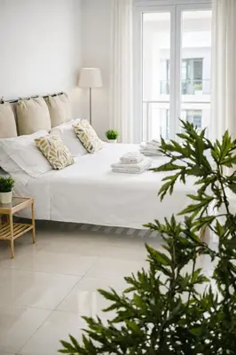 Letto o letti in una camera di SMN-Duomo Modern Apartment