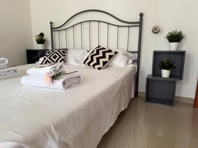 Letto o letti in una camera di SMN-Duomo Modern Apartment