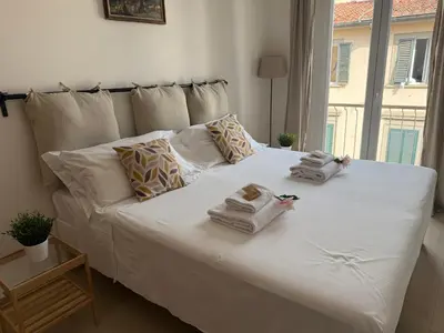 Letto o letti in una camera di SMN-Duomo Modern Apartment