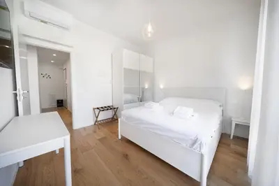 Letto o letti in una camera di Fortezza Home by MMega