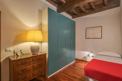 Letto o letti in una camera di Appartamento-Via dei Pilastri 32