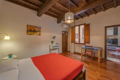 Letto o letti in una camera di Appartamento-Via dei Pilastri 32