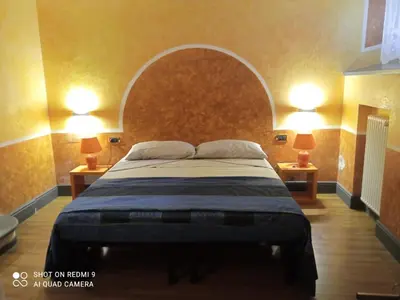 Letto o letti in una camera di Impruneta, Italy apartment with a view of the countryside