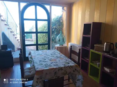 Area soggiorno di Impruneta, Italy apartment with a view of the countryside