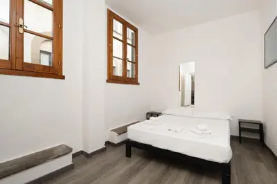 Letto o letti in una camera di Santo Spirito Urban Apartment
