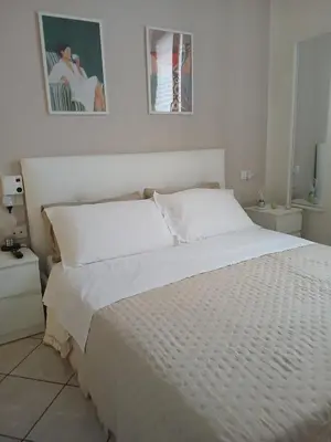 Letto o letti in una camera di appartamento a careggi casa diamante