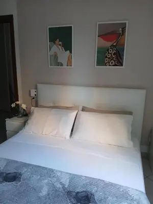 Letto o letti in una camera di appartamento a careggi casa diamante
