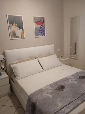 Letto o letti in una camera di appartamento a careggi casa diamante