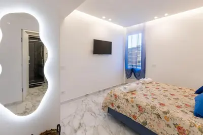 Letto o letti in una camera di Luxury Oasis Penthouse in Florence Center
