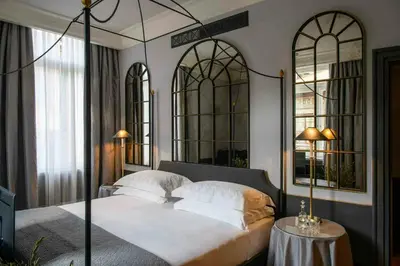 Letto o letti in una camera di Helvetia&Bristol Firenze – Starhotels Collezione