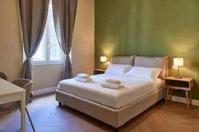 Letto o letti in una camera di BNB The Nymph and Africo Beccaria