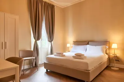 Letto o letti in una camera di BNB The Nymph and Africo Beccaria