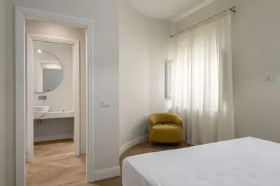 Letto o letti in una camera di The Signoria - Charming Apartment
