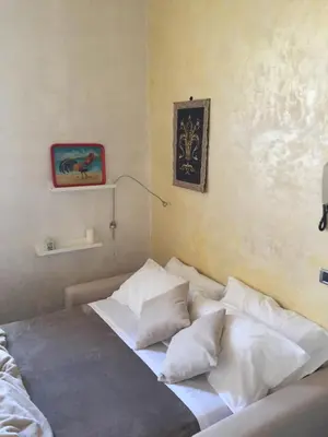 Letto o letti in una camera di Garden in Florence