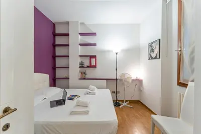 Letto o letti in una camera di UNYCA - Alfani Apartment