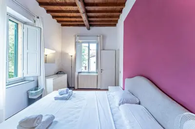 Letto o letti in una camera di UNYCA - Alfani Apartment