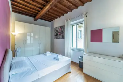 Letto o letti in una camera di UNYCA - Alfani Apartment