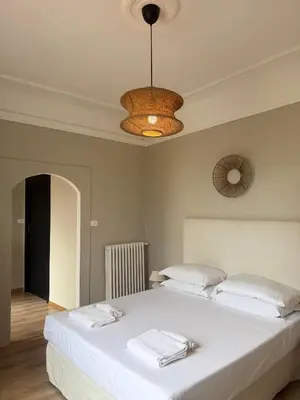 Letto o letti in una camera di Bohèmian View Santa Maria Novella