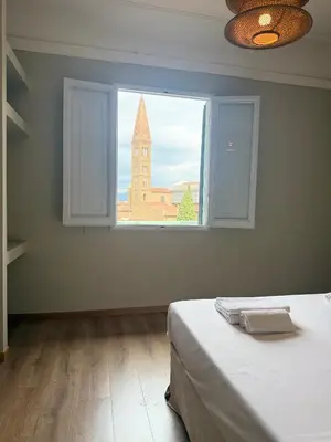 Letto o letti in una camera di Bohèmian View Santa Maria Novella
