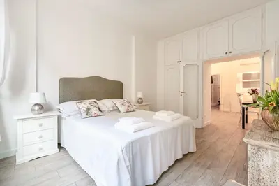Letto o letti in una camera di Lilla Suite - Florence Dolce Vita