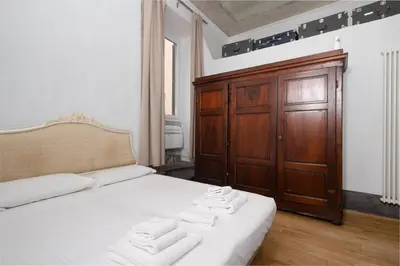 Letto o letti in una camera di Florence Duomo Grand Apartment