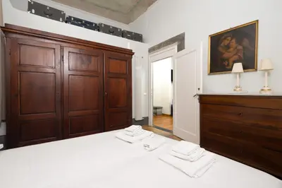 Letto o letti in una camera di Florence Duomo Grand Apartment