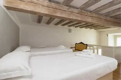 Letto o letti in una camera di Florence Duomo Grand Apartment
