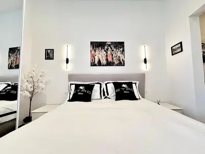 Letto o letti in una camera di Suite Rosselli-Centro Storico Firenze