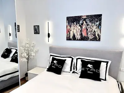 Letto o letti in una camera di Suite Rosselli-Centro Storico Firenze