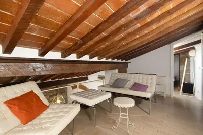 Area soggiorno di Tuscan Top Floor Duplex