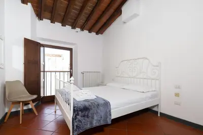 Letto o letti in una camera di Tuscan Top Floor Duplex