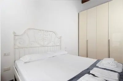 Letto o letti in una camera di Tuscan Top Floor Duplex