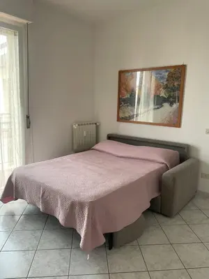 Letto o letti in una camera di Sama Three Apartment