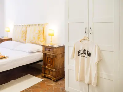 Letto o letti in una camera di Torquato - Unique stay from a Renaissance Kitchen
