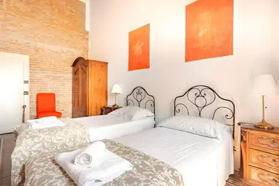 Letto o letti in una camera di Art & Soul Florence Apartment with AC- UNESCO Downtown - 3 bedrooms