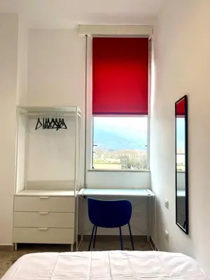 Letto o letti in una camera di Appartamento vicino a Firenze