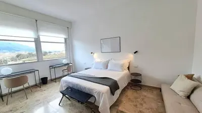 Letto o letti in una camera di Appartamento vicino a Firenze