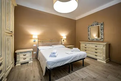 Letto o letti in una camera di YD penthouse Torregalli