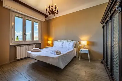 Letto o letti in una camera di YD penthouse Torregalli