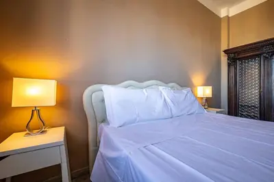 Letto o letti in una camera di YD penthouse Torregalli