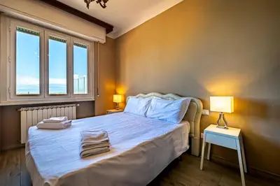 Letto o letti in una camera di YD penthouse Torregalli