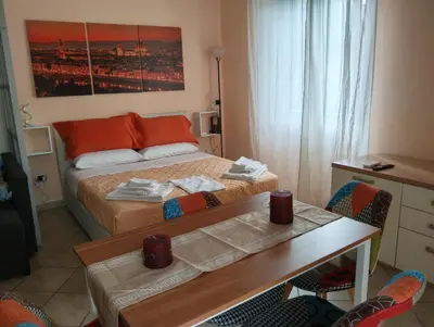 Letto o letti in una camera di Le mura di FLÀ