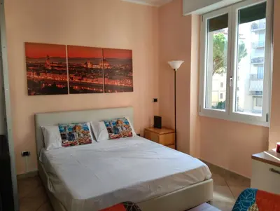 Letto o letti in una camera di Le mura di FLÀ
