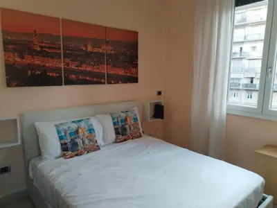 Letto o letti in una camera di Le mura di FLÀ