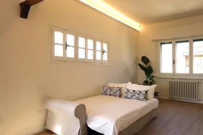 Letto o letti in una camera di attico claudia